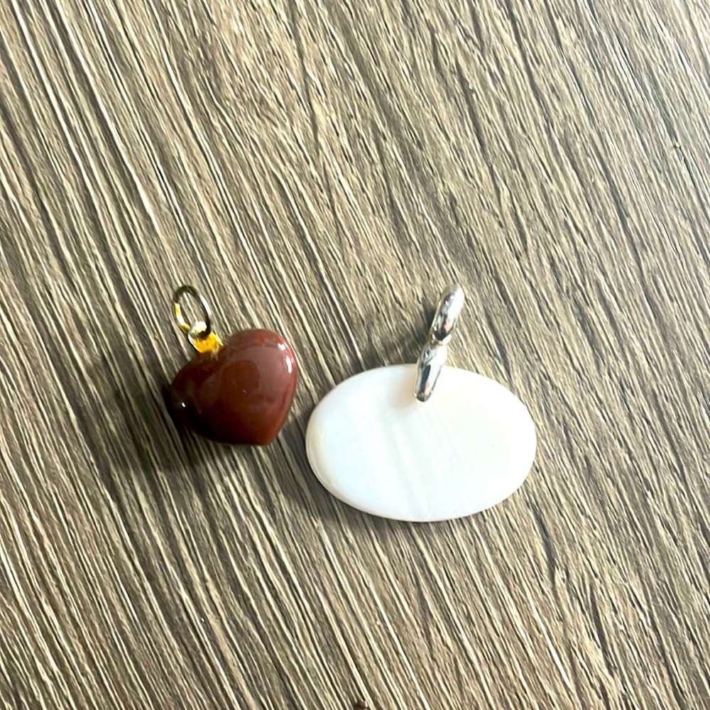 Heart pendant and oval opal looking pendant